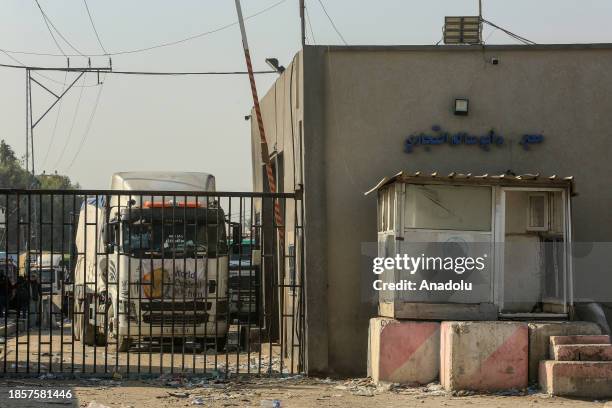 Humanitarian aid trucks sent by UNRWA and Red Crescent pass through Rafah Border Crossing on Egyptian border as they drive to a storage of UNRWA, in...