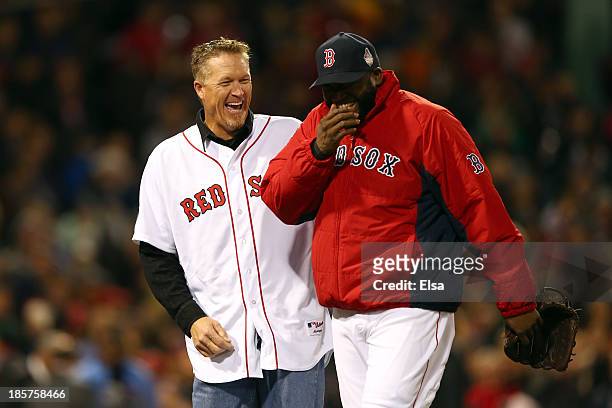 David Ortiz of the Boston Red Sox and former player Mike Timlin speak before Game Two of the 2013 World Series against the St. Louis Cardinals at...