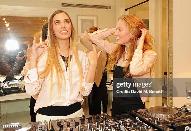 Amber Le Bon and Clara Paget attend a drinks reception celebrating the opening of Club Monaco's first London store in Westbourne Grove on October 24,...