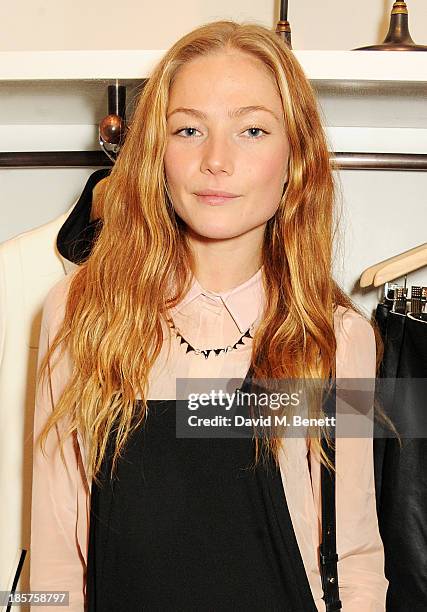 Clara Paget attends a drinks reception celebrating the opening of Club Monaco's first London store in Westbourne Grove on October 24, 2013 in London,...