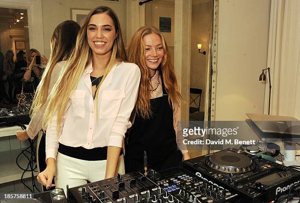 Amber Le Bon and Clara Paget attend a drinks reception celebrating the opening of Club Monaco's first London store in Westbourne Grove on October 24,...
