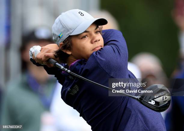 Charlie Woods of the United States plays his tee shot on the first tee during the Friday pro-am as a preview for the PNC Championship at The...