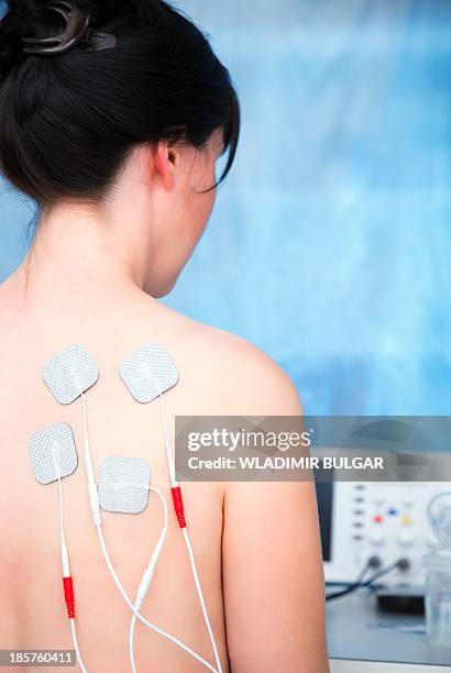 electrical muscle stimulation - ems stockfoto's en -beelden