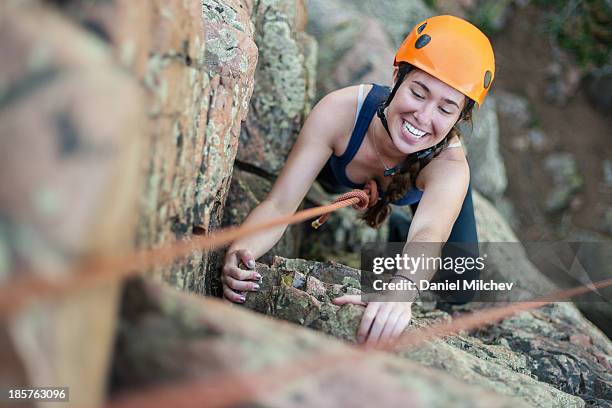 girl rock having fun while rock climbing. - rock climbing stock-fotos und bilder