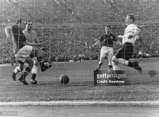 Hungarian captain Ferenc Puskas scores his team's second goal in the 17th minute of a friendly international at the Nepstadion, Budapest, 23rd May...