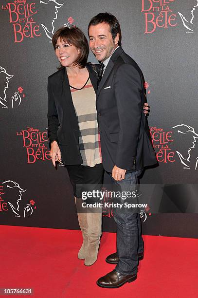 Liane Foly and Bernard Montiel attend the 'Beauty and the Beast' Paris Premiere at Theatre Mogador on October 24, 2013 in Paris, France.