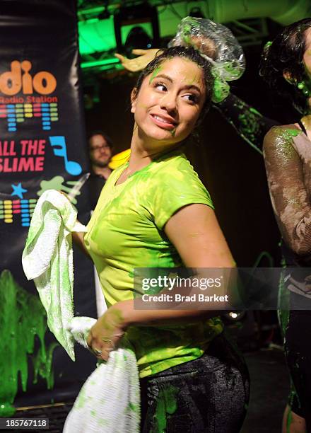 Ally Brooke Hernandez of Fifth Harmony gets slimed at iHeartRadio's Nick Radio launch party on October 24, 2013 in New York City.