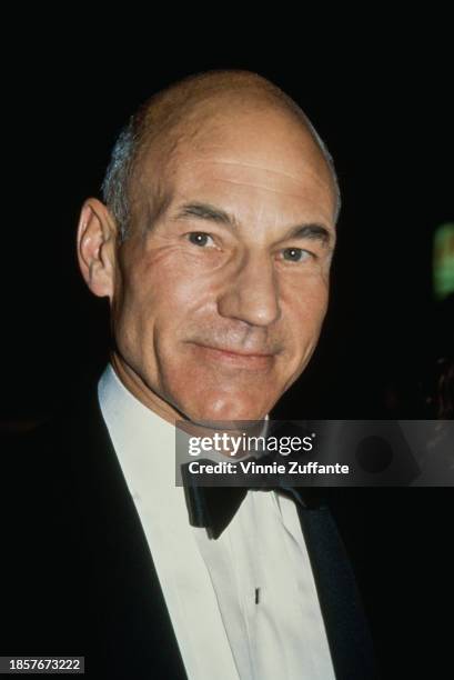 British actor Patrick Stewart, wearing a tuxedo, a white shirt with square buttons and bow tie, attends the 42nd Primetime Emmy Awards, held at the...