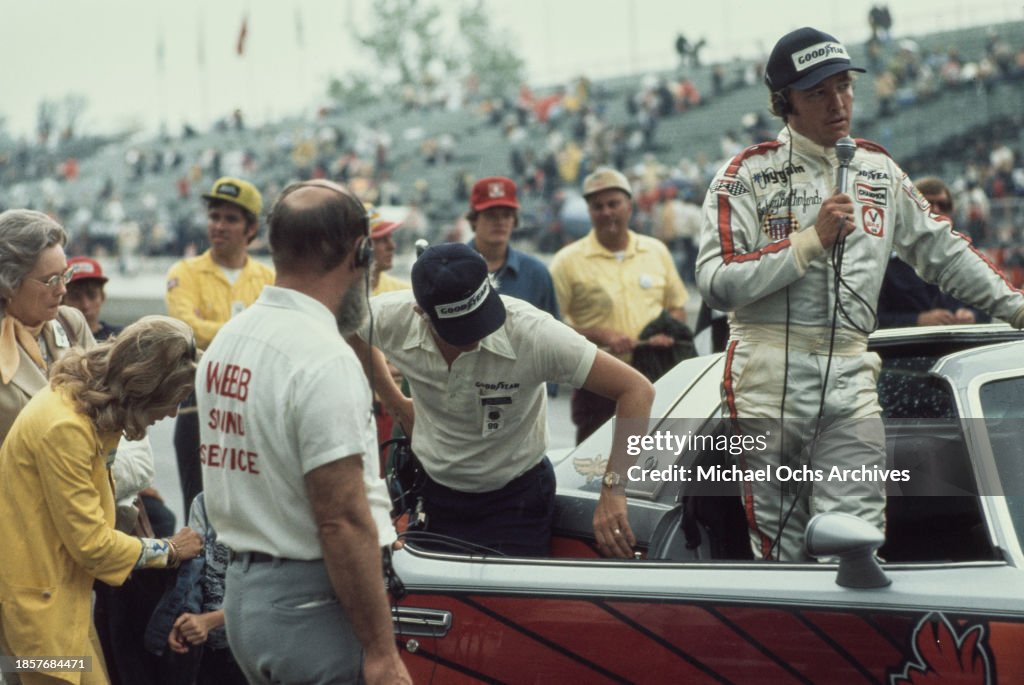 Johnny Rutherford Racing American racing driver Johnny Rutherford, wearing coveralls while ...