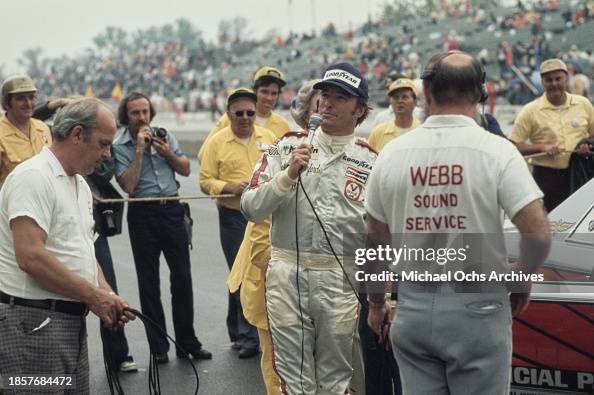 Joey Rutherford Racing American racing driver Johnny Rutherford, wearing coveralls while ...