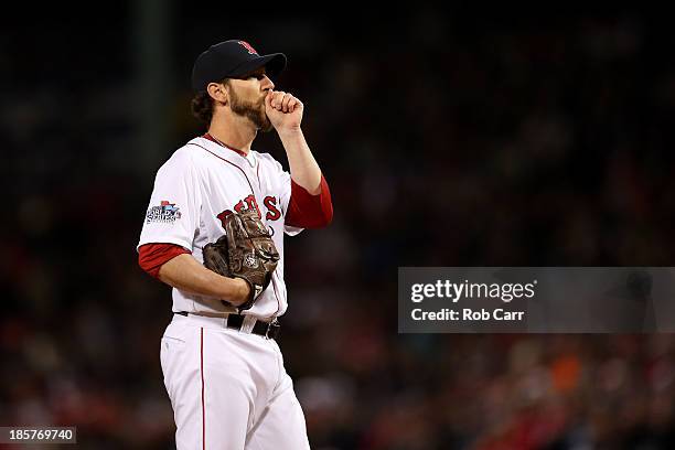 Craig Breslow of the Boston Red Sox reacts in the seventh inning against the St. Louis Cardinals during Game Two of the 2013 World Series at Fenway...