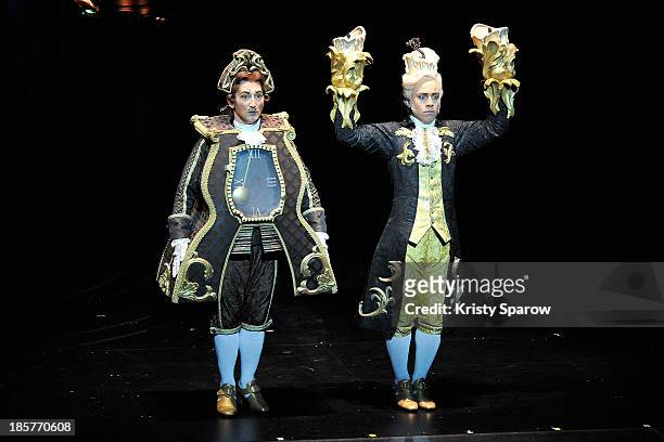 Actors perform onstage during the 'Beauty and the Beast' opening night dress rehearsal at Theatre Mogador on October 24, 2013 in Paris, France.