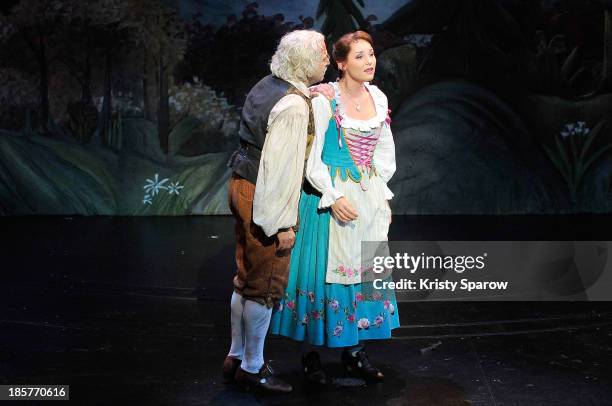 Actors perform onstage during the 'Beauty and the Beast' opening night dress rehearsal at Theatre Mogador on October 24, 2013 in Paris, France.