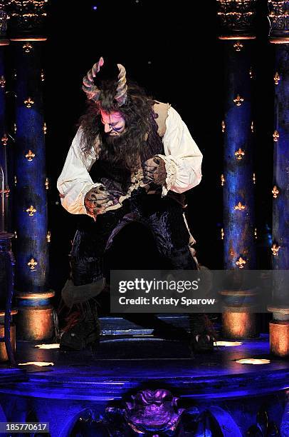 An actor performs onstage during the 'Beauty and the Beast' opening night dress rehearsal at Theatre Mogador on October 24, 2013 in Paris, France.