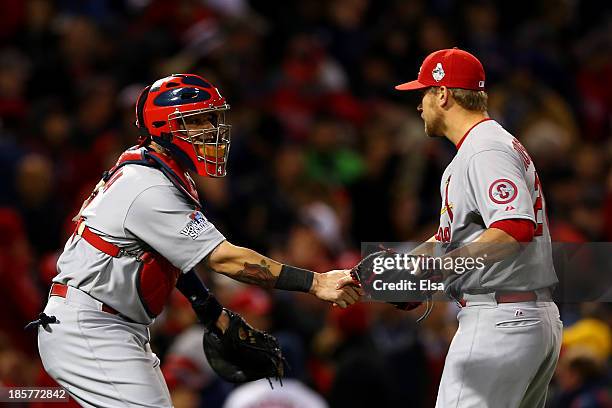 Trevor Rosenthal and Yadier Molina of the St. Louis Cardinals celebrate after defeating the Boston Red Sox 4-2 in Game Two of the 2013 World Series...