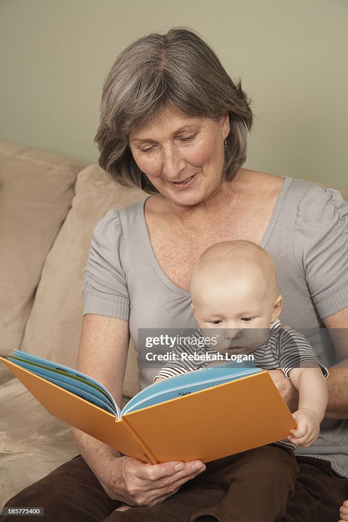 Gramma reading to baby.