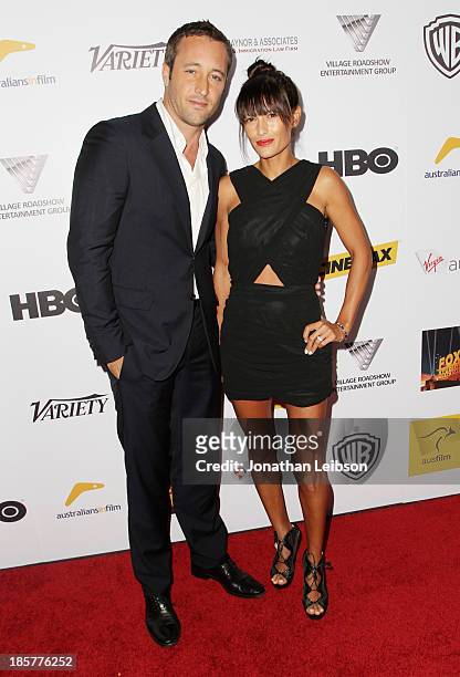 Actor Alex O'Loughlin and surfer Malia Jones attend the 2nd Annual Australians in Film Awards Gala at Intercontinental Hotel on October 24, 2013 in...