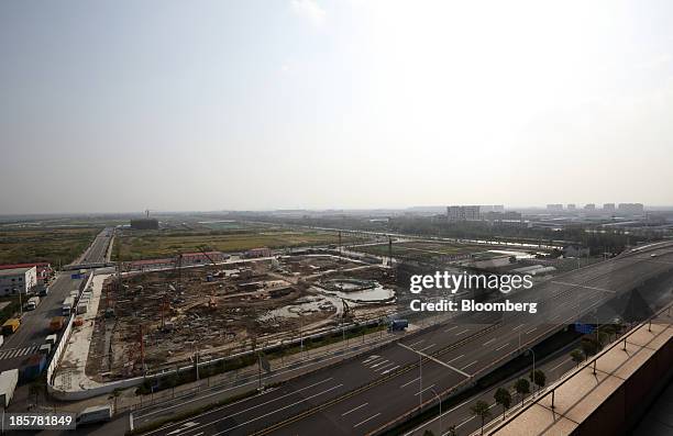 Construction continues at China Pilot Free Trade Zone's Pudong free trade zone in Shanghai, China, on Thursday, Oct. 24, 2013. The area is a testing...