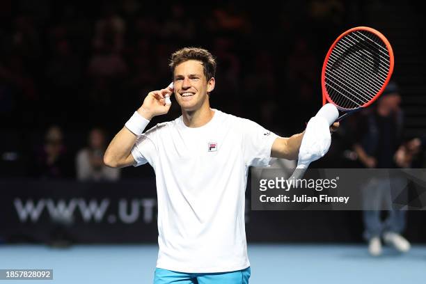 Diego 'El Peque' Schwartzman of Argentina celebrates after winning match point in the Group A match against Benoit 'The Rebel' Paire of France on Day...