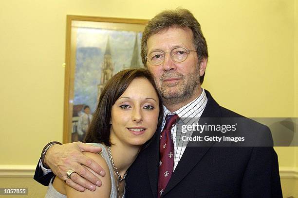 Guitar legend Eric Clapton poses with his daughter Ruth before a performance in Birkdale school sports hall, Sheffield, England on March 18, 2003....