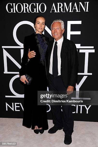 Actress Isabel Lucas, wearing Armani , and fashion designer Giorgio Armani attend Giorgio Armani One Night Only NYC at SuperPier on October 24, 2013...