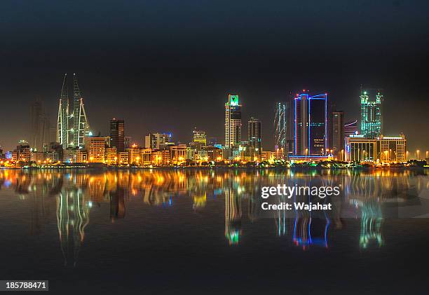 bahrain glitters - bahrain city stock pictures, royalty-free photos & images