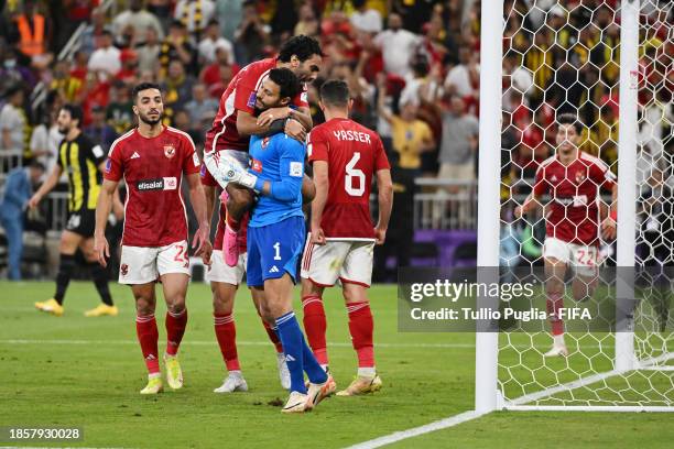 Mohamed Elshenawy of Al Ahly FC celebrates after saving a penalty from Karim Benzema of Al Ittihad during the FIFA Club World Cup Saudi Arabia 2023...