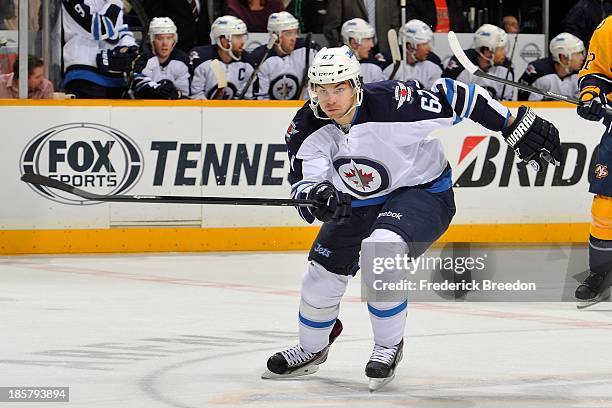 Michael Frolik of the Winnipeg Jets skates against the Nashville Predators at Bridgestone Arena on October 24, 2013 in Nashville, Tennessee.