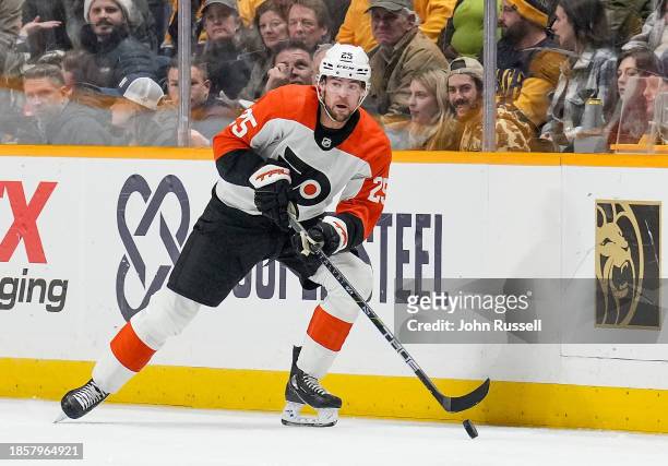 Ryan Poehling of the Philadelphia Flyers skates against the Nashville Predators during an NHL game at Bridgestone Arena on December 12, 2023 in...