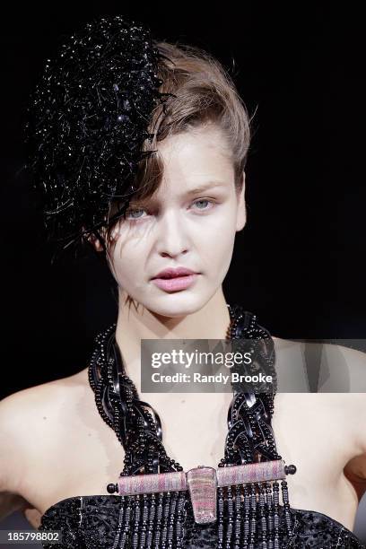 Model walks the runway during the Armani - One Night Only New York at SuperPier on October 24, 2013 in New York City.