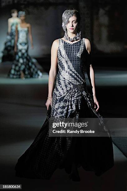 Model walks the runway during the Armani - One Night Only New York at SuperPier on October 24, 2013 in New York City.