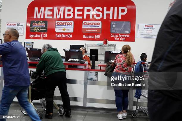 Customers visit a Costco Wholesale store on December 15, 2023 in Miami, Florida. Costco Wholesale beat expectations for the company's Q1 earnings...