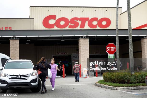 Customers visit a Costco Wholesale store on December 15, 2023 in Miami, Florida. Costco Wholesale beat expectations for the company's Q1 earnings...