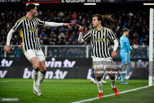 Dusan Vlahovic of Juventus FC and Federico Chiesa of Juventus FC celebrates a goal during the Serie A TIM match between Genoa CFC and Juventus at...