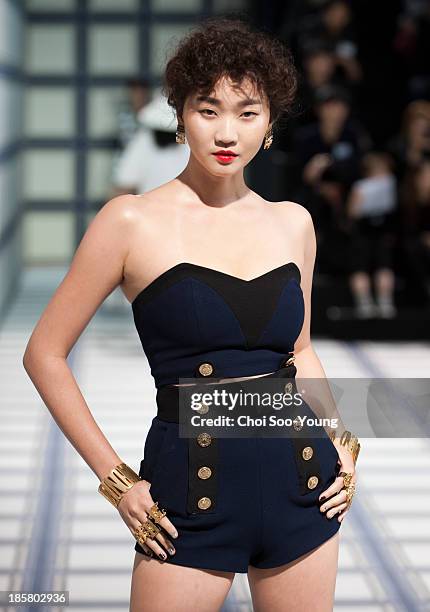 Jang Yoon-Ju walks the runway during the Jardin De Chouette show at Seoul Fashion Week 2014 S/S at Grand Hyatt Hotel on October 22, 2013 in Seoul,...