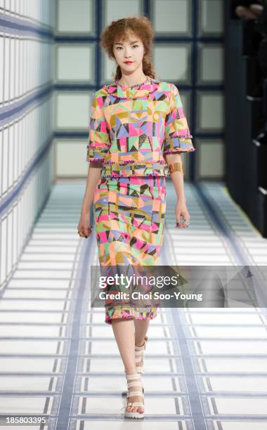 Model walks the runway during the Jardin De Chouette show at Seoul Fashion Week 2014 S/S at Grand Hyatt Hotel on October 22, 2013 in Seoul, South...