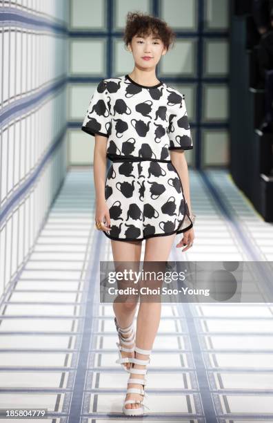 Model walks the runway during the Jardin De Chouette show at Seoul Fashion Week 2014 S/S at Grand Hyatt Hotel on October 22, 2013 in Seoul, South...