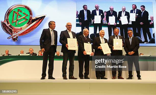 Klaus-Dieter Fischer, Karl Hofmeister, Wilfried Heitmann and Harald Strutz are honored by DFB president Wolfgang Niersbach and DFB general secretary...