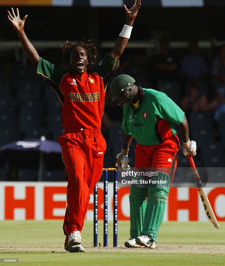 Henry Olonga of Zimbabwe successfully appeals for the wicket of Kennedy Obuya of Kenya