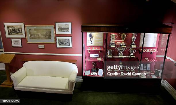 View from the staircase in the clubhouse of the medals and memorabilia of John Ball Jr and Harold H Hilton famous members at Royal Liverpool Golf...