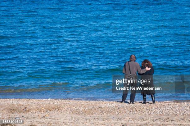friendly caress - pat on the back stockfoto's en -beelden