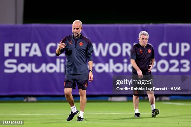 Pep Guardiola the head coach / manager of Manchester City and assistant manager Juanma Lillo during the MD-1 training session prior to the FIFA Club...