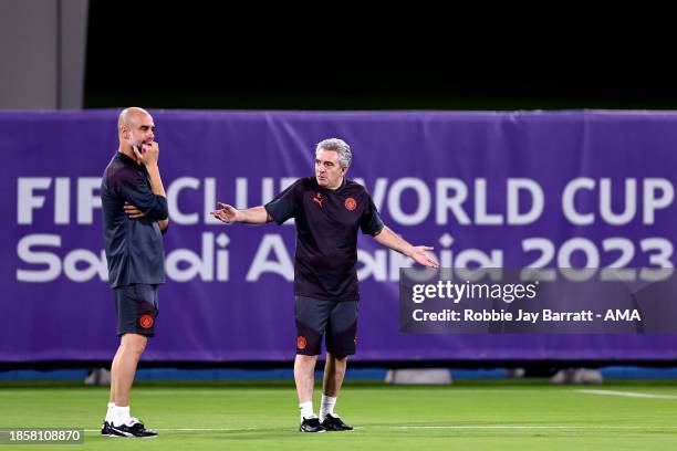 Pep Guardiola the head coach / manager of Manchester City and assistant manager Juanma Lillo during the MD-1 training session prior to the FIFA Club...