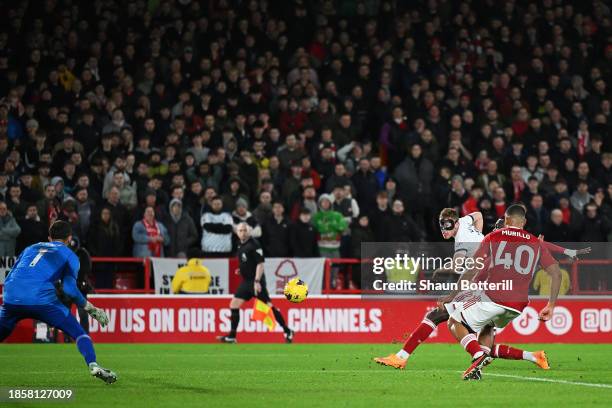 Dejan Kulusevski of Tottenham Hotspur scores their team's second goal during the Premier League match between Nottingham Forest and Tottenham Hotspur...