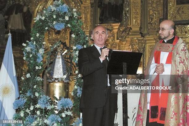 Argentine president Fernando de la Rua speaks during a mass 30 November 2000 in Mexico City for the Virgin of Lujan, patron of Argentina. El...