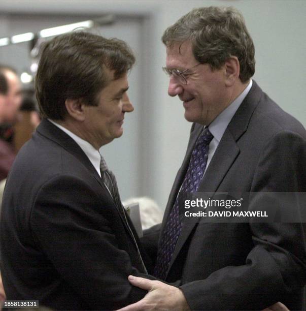 Dr. Haris Silajdzic , president of the Party for Bosnia-Herzegovina, is greeted by US ambassador to the United Nations, Richard Holbrooke , 17...