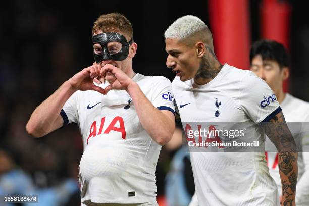 Dejan Kulusevski of Tottenham Hotspur celebrates after scoring their team's second goal with teammate Richarlison during the Premier League match...