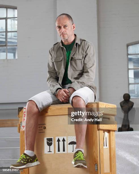 Artist Dinos Chapman is photographed for the Observer on May 15, 2013 in London, England.