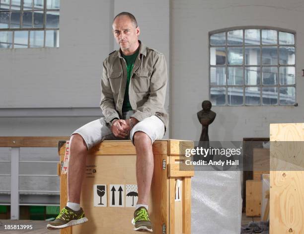 Artist Dinos Chapman is photographed for the Observer on May 15, 2013 in London, England.