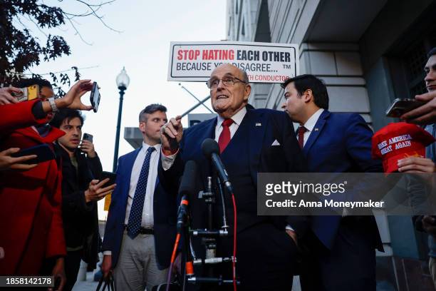 Rudy Giuliani, the former personal lawyer for former U.S. President Donald Trump, speaks with reporters outside of the E. Barrett Prettyman U.S....
